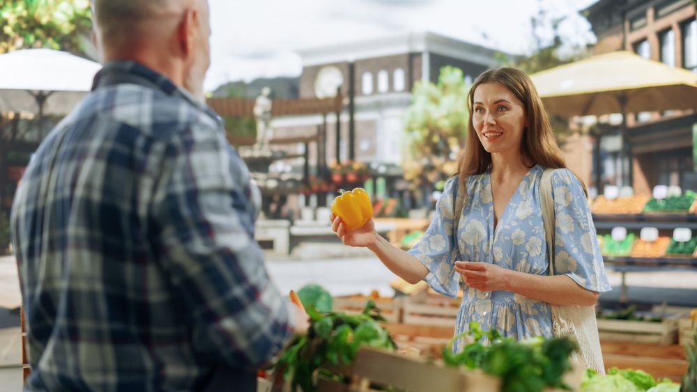 Portrait of a Young Customer Shopping for Organic Seasonal Fruits and Vegetables for a Healthy Breakfast.