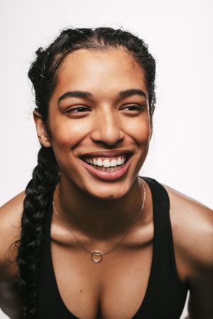 Close up portrait of smiling female athlete