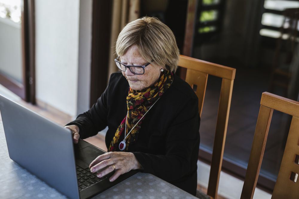 Mature female using laptop