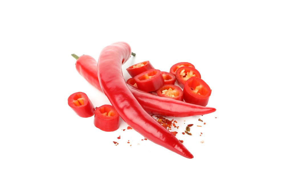 Tasty red chilli peppers isolated on blank background