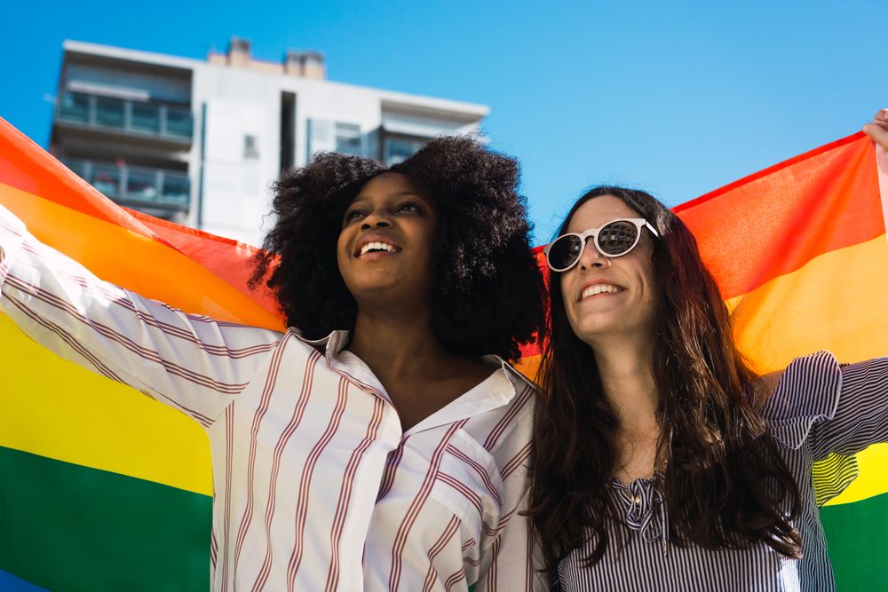 couple with LGBT flag