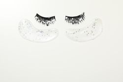 concept of cosmetology tools and beauty treatment, false eyelashes