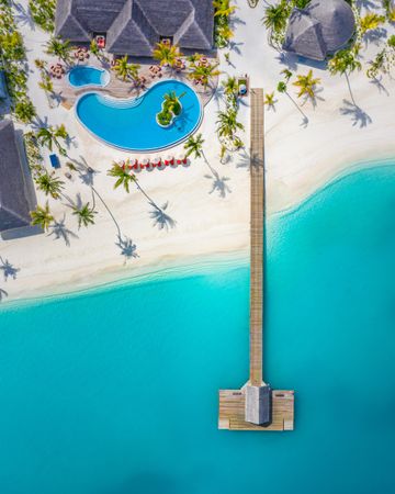 Aerial view of a pristine beach resort in the Maldives
