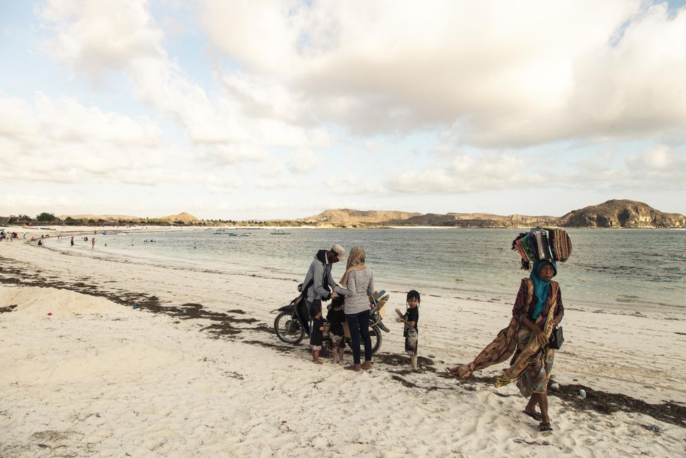 People walking on beach