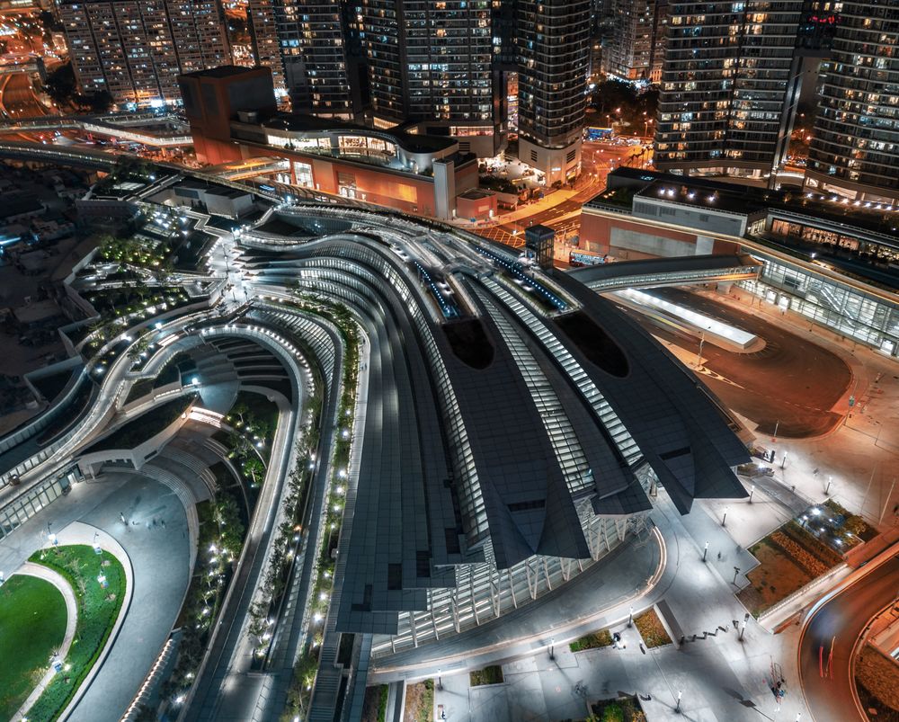 Aerial view of high speed train station in West Kowloon in Hong Kong at night