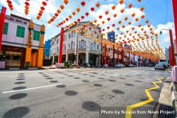 Street decorated with Chinese New Year red Lanterns under blue sky in Singapore 56ddPb