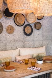 Wicker lamps in street cafe
