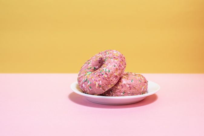 Pink doughnuts in a colorful background