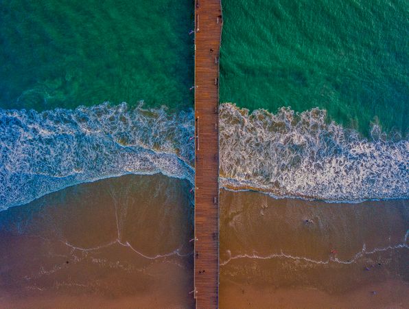 Aerial view of fishing pier on water