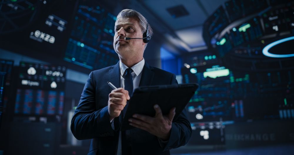 Businessman Analyzing Financial and Corporate Data