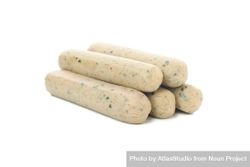 Light colored sausages piled on blank background 0W3kp0