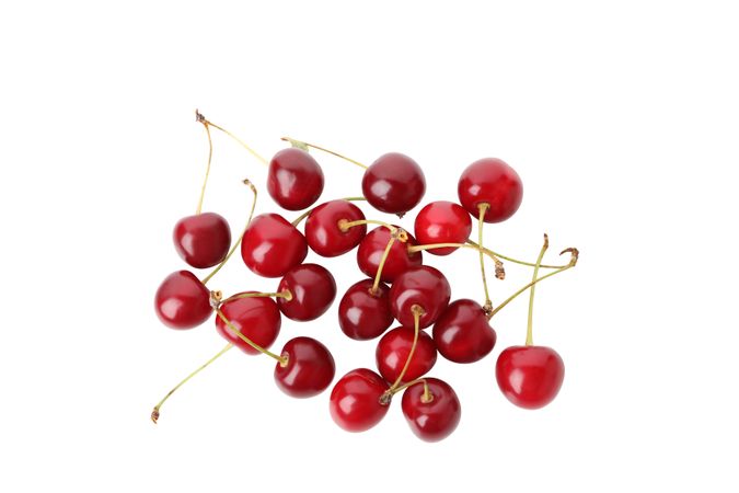 ripe cherry fruits, isolated on blank background