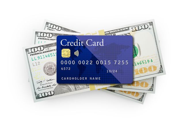 Thirty Thousand Dollars Stack of One Hundred Dollar Bills with a Credit Card