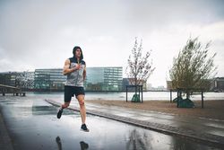 Man running outside on overcast day
