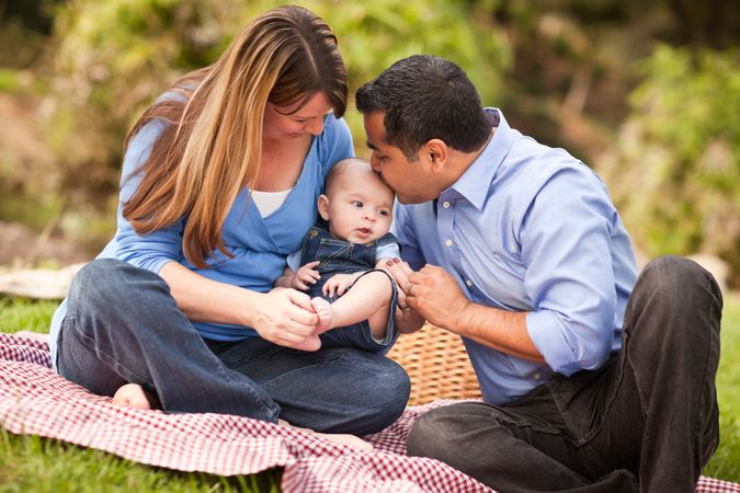 Loving Family Playing In The Park