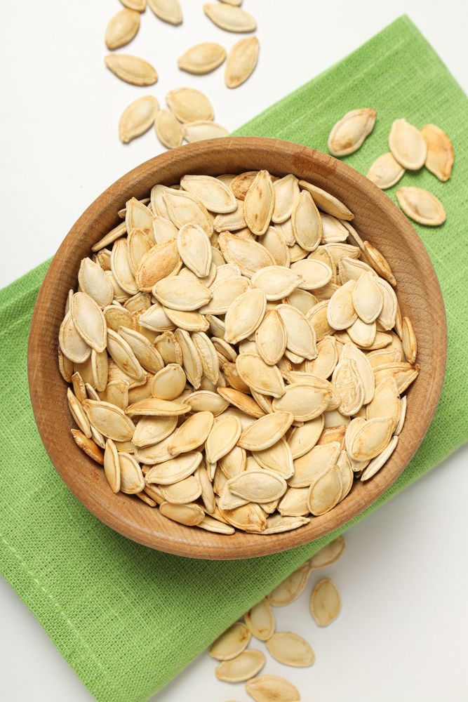 Cooking ingredients for fall season - pumpkin seeds, pumpkin