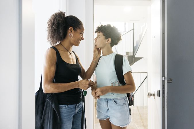 Mother and her daughter arriving home