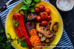 To view plate of grilled vegetable on striped blue napkin 4d87AA