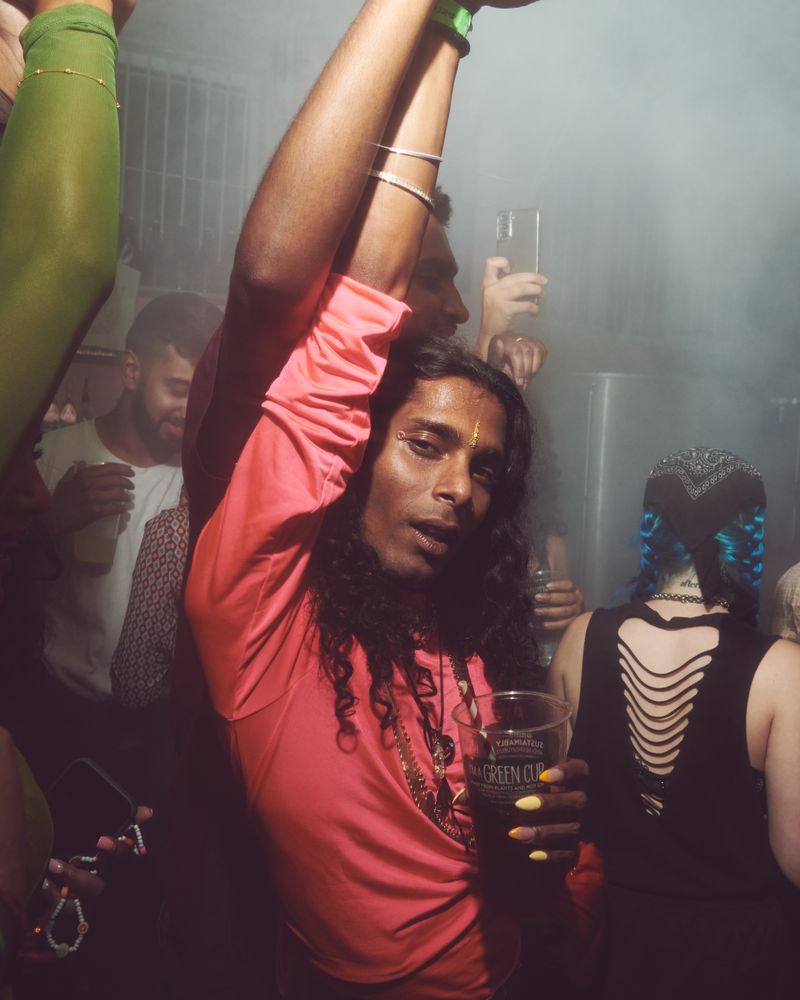 London, England, United Kingdom - Nov 9, 2022: Man dancing in smokey room at Dialled In Fest