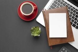 Arrangement of office elements on dark table