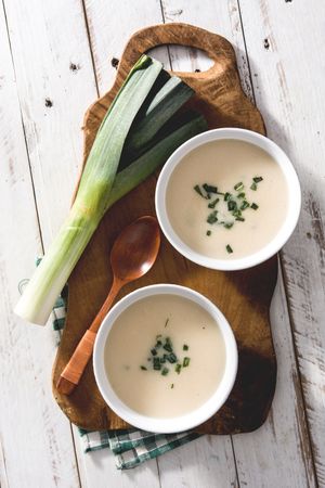 Shoot from above of two bowls of tasty Vichyssoise soups