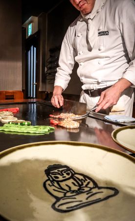 Japanese chef preparing food