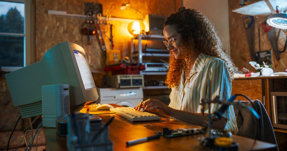 Intelligent Woman Writing Code, Working On Innovative Portable Device, Starting Tech Startup Company.