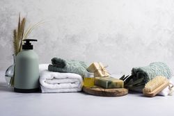 Bath decorations with soap bottle and towel