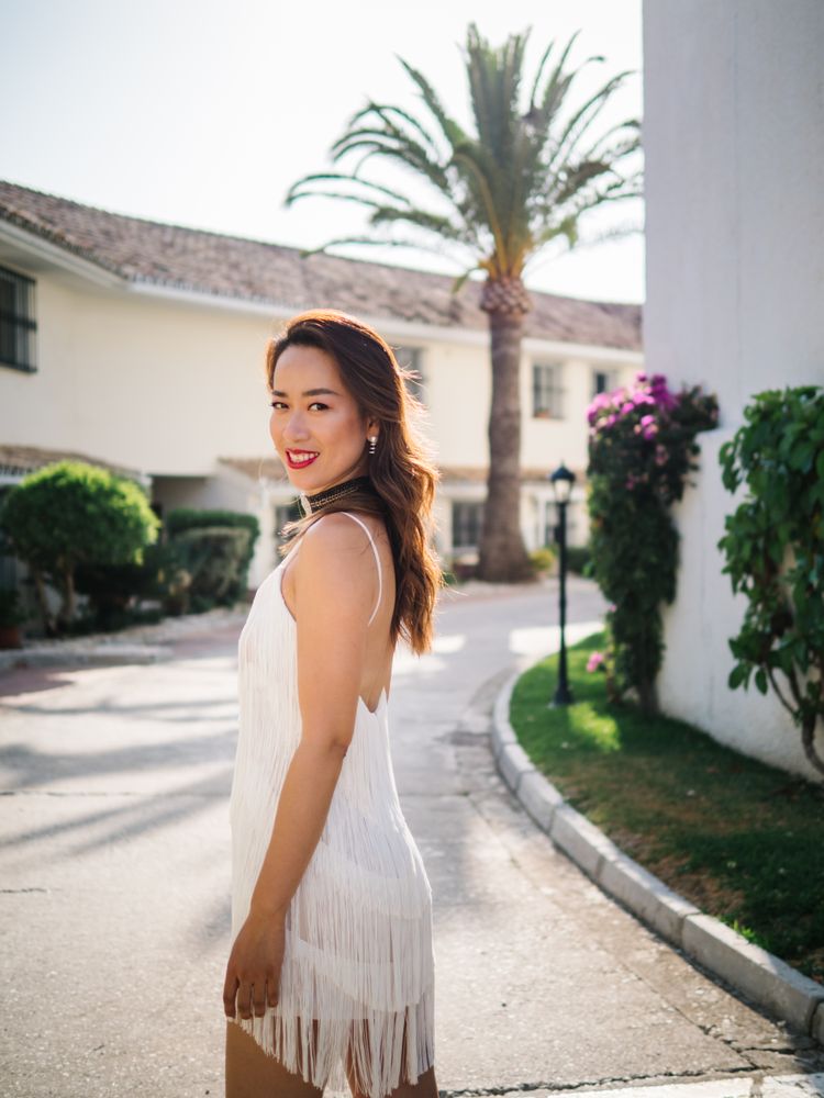 Young elegant Asian woman at a luxurious resort