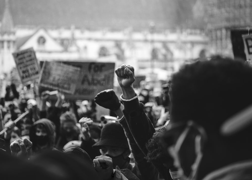 London, England, United Kingdom - June 6th, 2020: Large group at BLM protest with raised fists