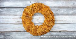 Wreath made of natural fungi or mushroom on rustic wood background 5nYen0