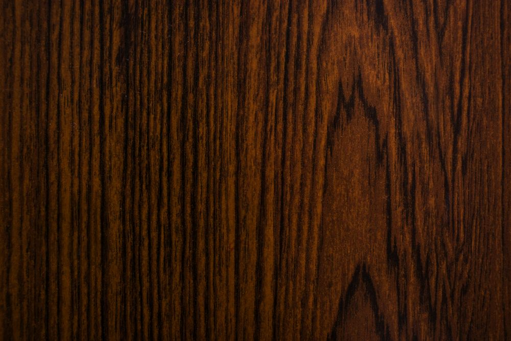 Texture background of top view of a dark flat wooden table
