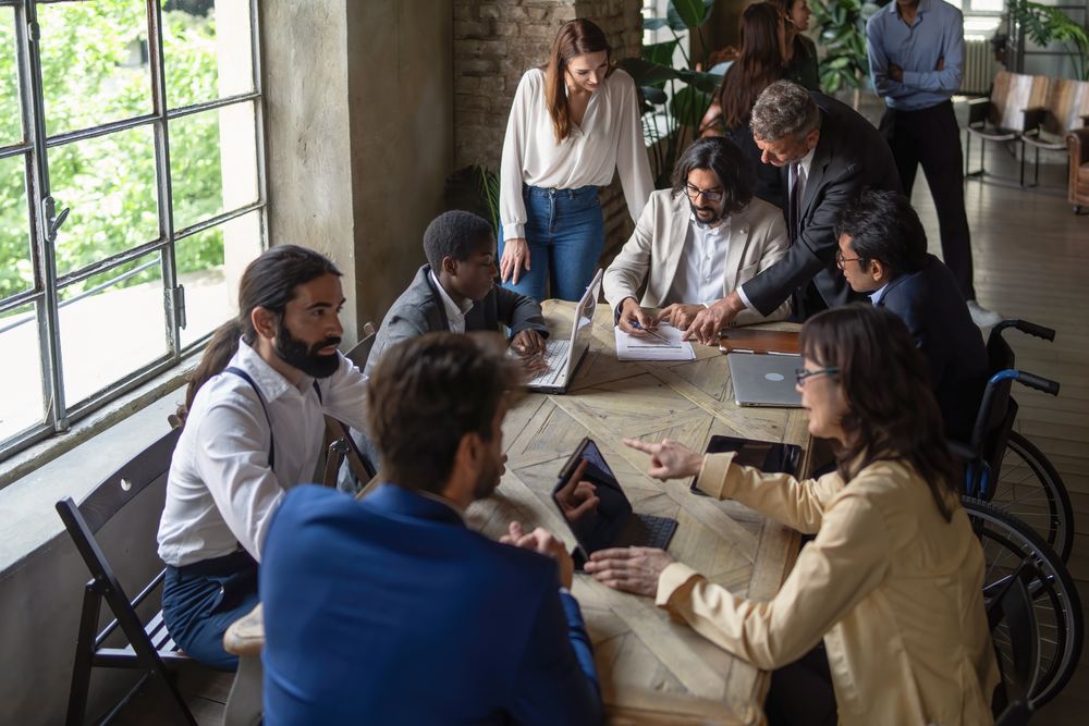 Business colleagues working together around a table