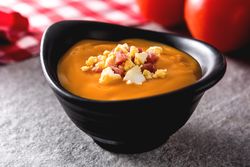 Bowl with salmorejo ham and hard boiled egg