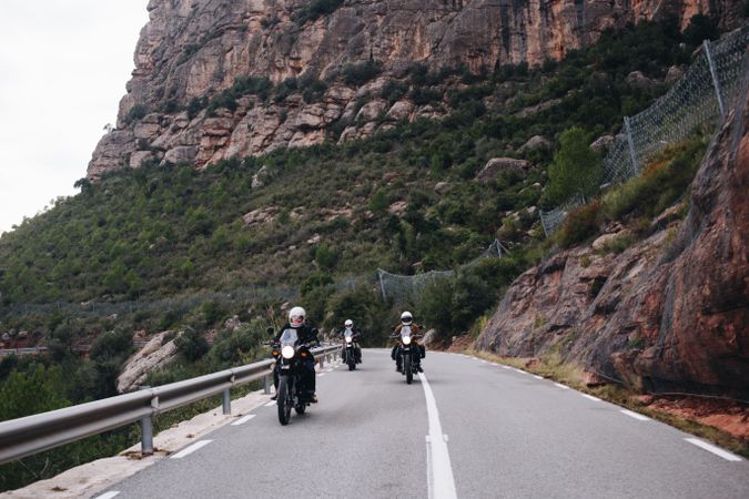 Motorcycle club going for a ride outdoors together