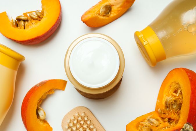 Skin care and face care concept - pumpkin cosmetic