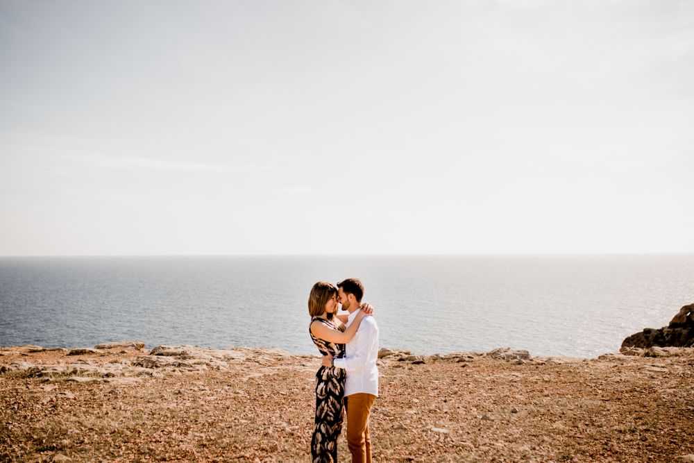 Tender lovers cuddling on seashore
