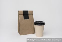 Paper bag with coffee cup bE63n0