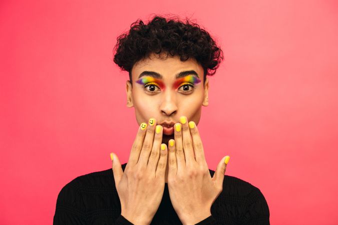 Male with funky rainbow makeup