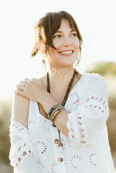 Charming smiling woman with trendy accessories outdoors