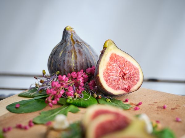 Ripe figs on cutting board