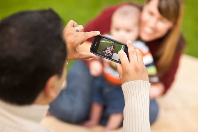 Happy Parents and Baby Boy Taking Self Portraits