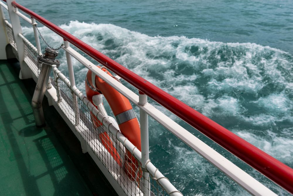 Close-up of a boat interior and waves on Lake Constance, in Germany