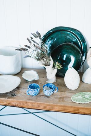 Shelf of ceramic objects in shop
