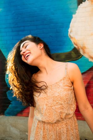 Funny woman making silly face on street