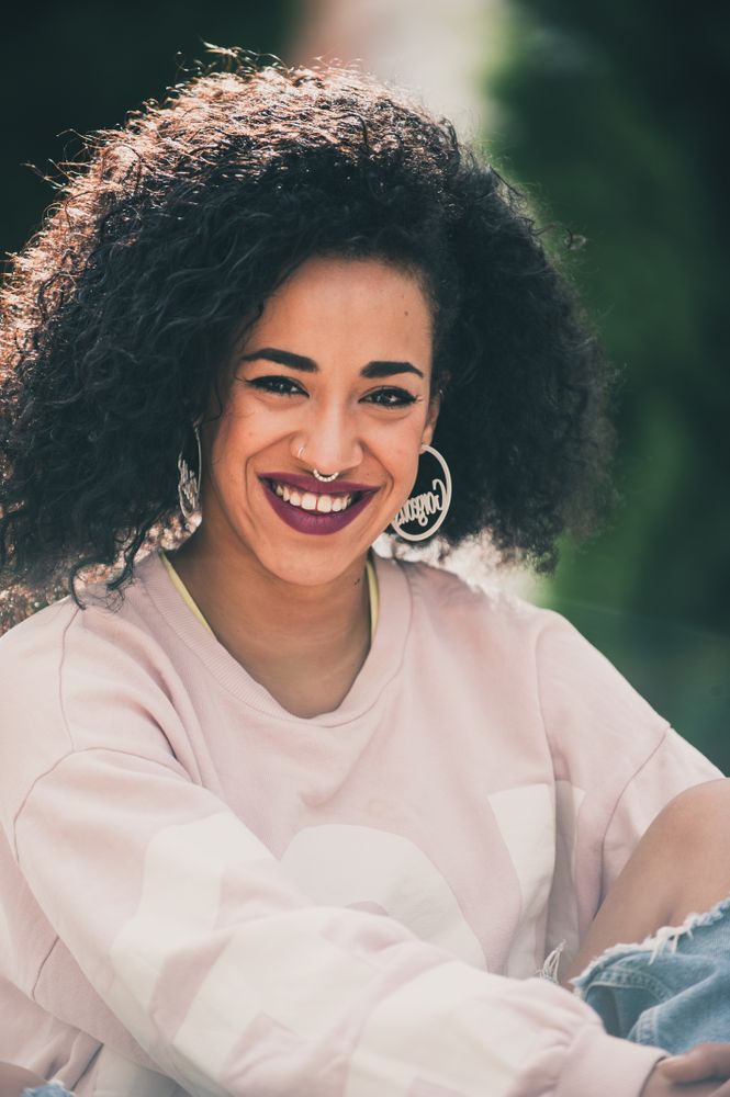 Portrait of modern woman with curls