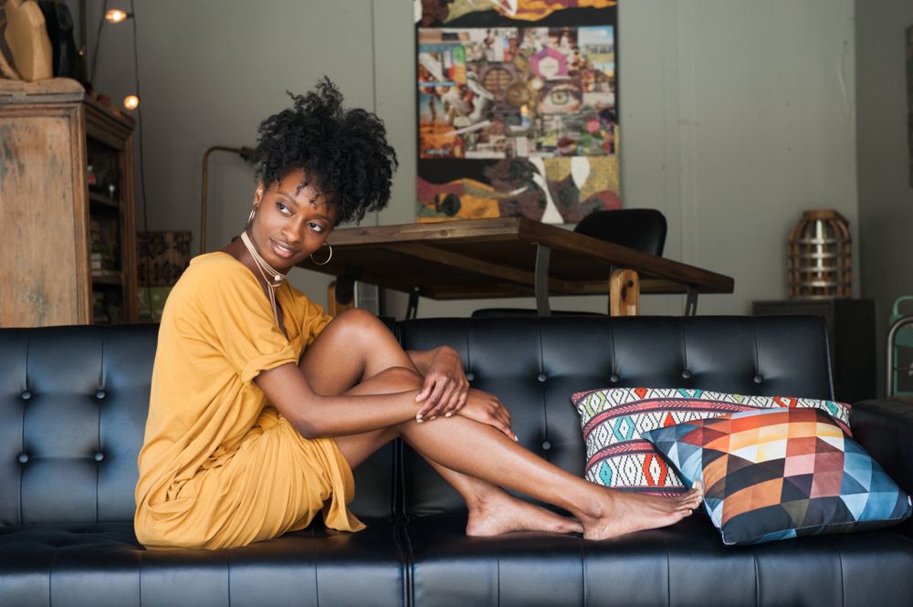 Smiling woman on couch