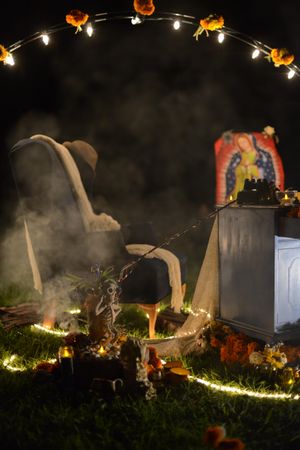 Altar at evening Day of the Dead event at cemetery