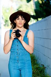 Transgender woman with digital SLR