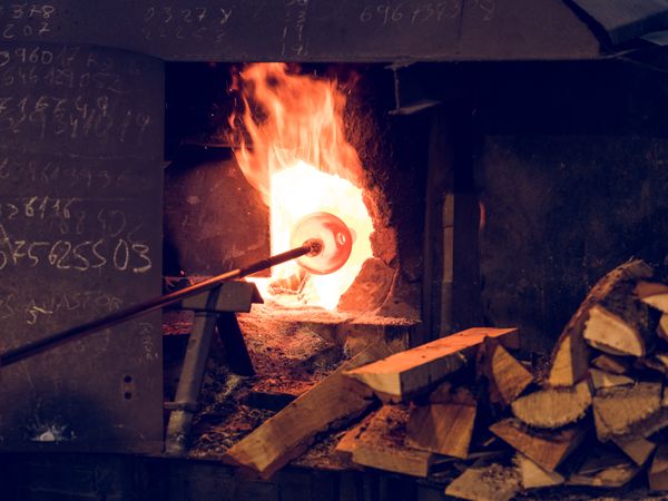 Glass in furnace with burning fire